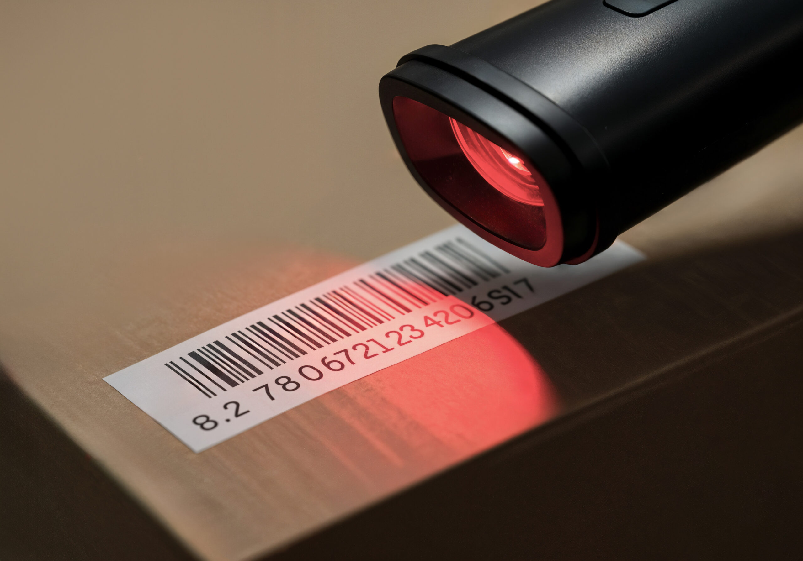 scanning barcode label with laser scanner scaled